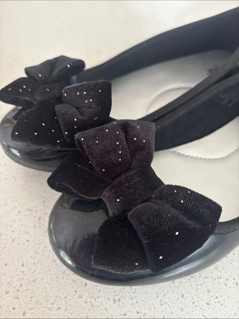 Girls black bow flats